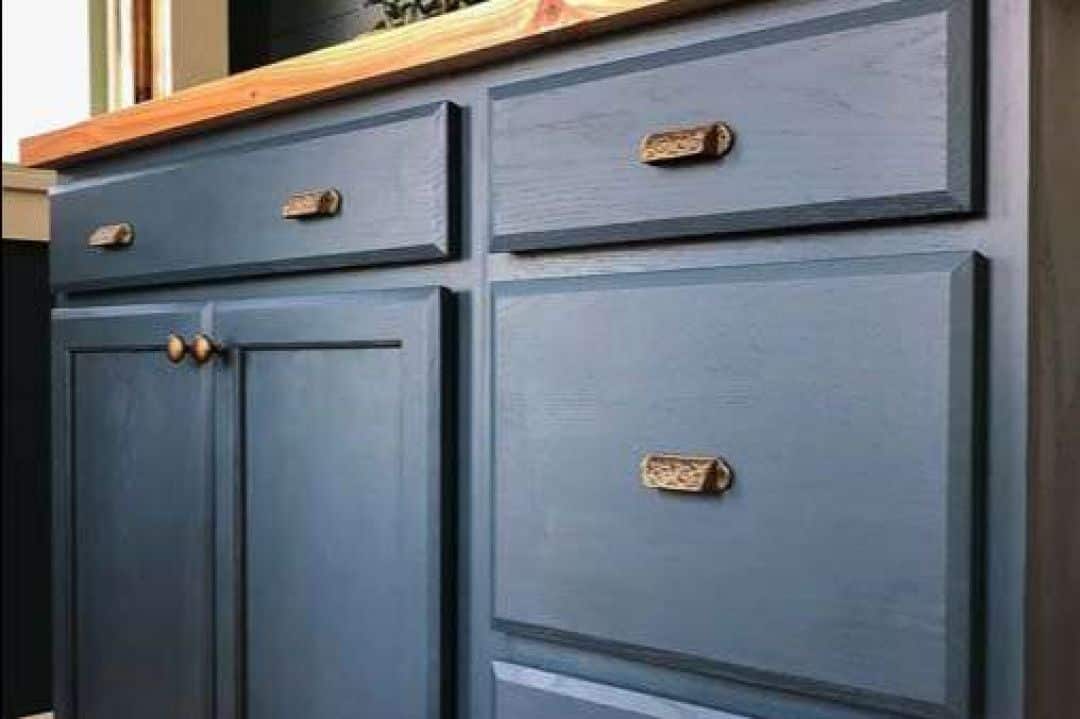 Bluish Gray Kitchen Cabinet Painting Tucson Bluish gray kitchen cabinets with a modern satin finish painted by Red Door Painting Pros in Tucson.