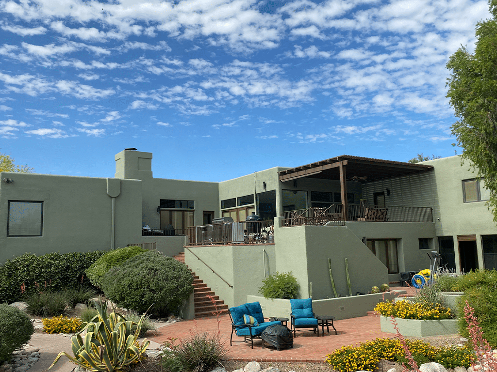 Residential exterior repaint project with durable green finish in Tucson” Tucson home painted in modern green tone by Red Door Painting Pros