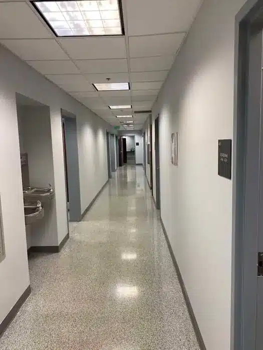 Interior business hallway freshly painted with professional finishes and clean color tones in Tucson.