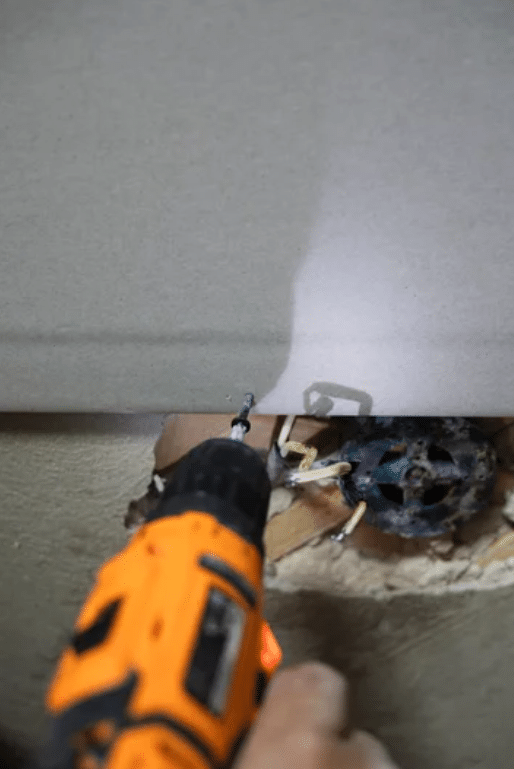 drywall-screw White kitchen cabinets with a smooth, professional painted finish by Red Door Painting Pros in Tucson.